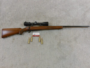 Ruger Model 77 Bolt Action Rifle In 7 m/m Remington Magnum With Scope Ammunition And New Reloading Brass ITEM 3404
